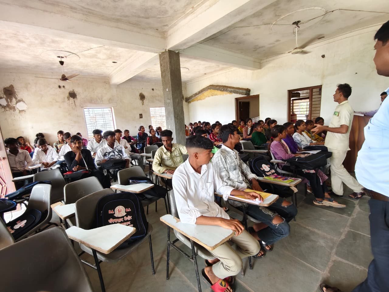 Lecture in progress in a full classroom