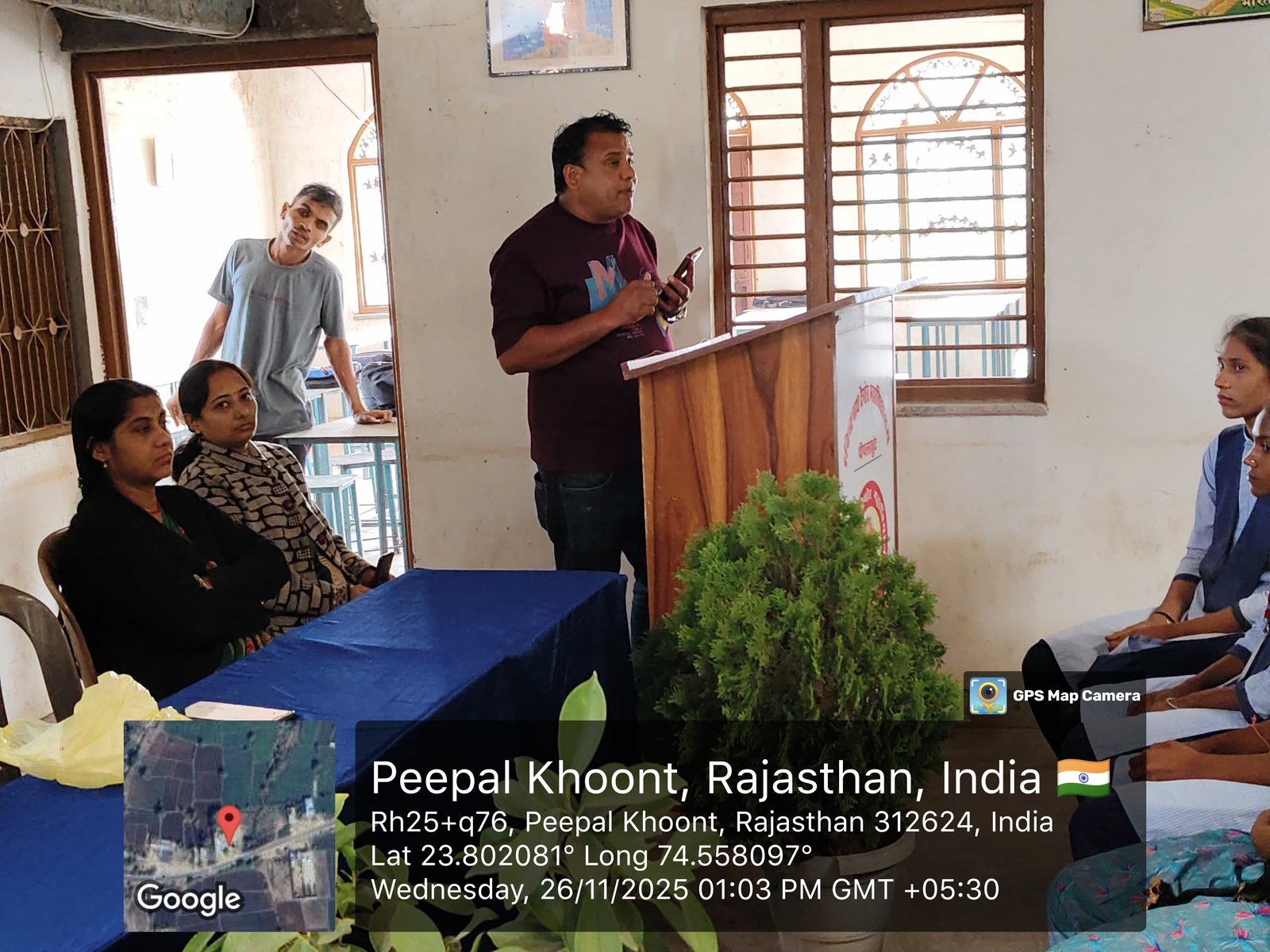 Faculty member addressing students at orientation